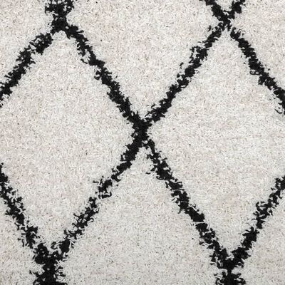 vidaXL shaggy gulvtæppe 60x110 cm høj luv cremefarvet og sort