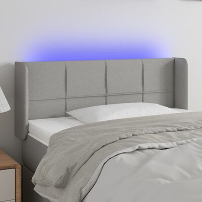 vidaXL sengegavl med LED-lys 83x16x78/88 cm stof lysegrå