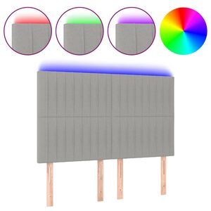 vidaXL sengegavl med LED-lys 144x5x118/128 cm stof lysegr&aring;
