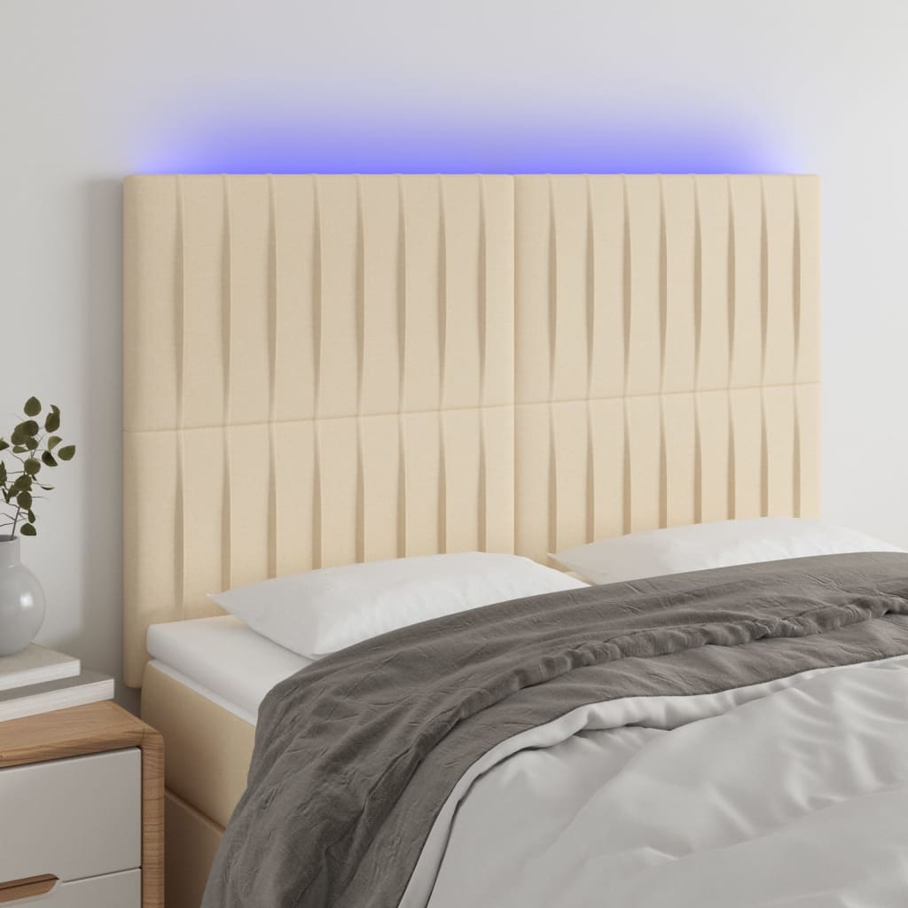 vidaXL sengegavl med LED-lys 144x5x118/128 cm stof cremefarvet
