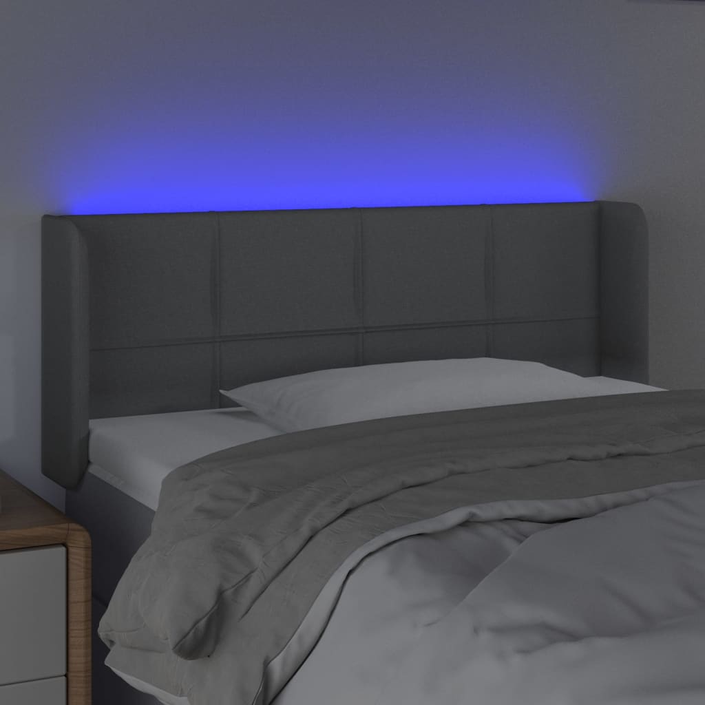 vidaXL sengegavl med LED-lys 83x16x78/88 cm stof lysegrå