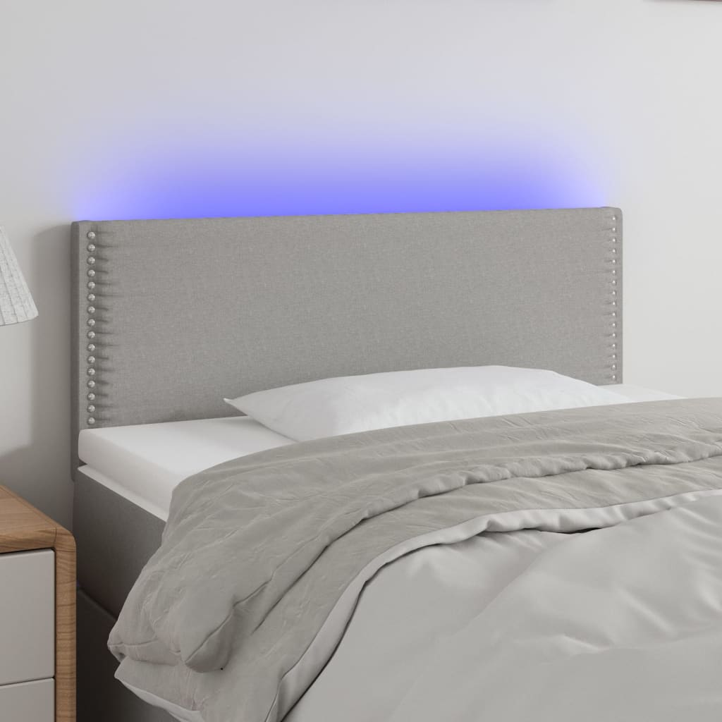 vidaXL sengegavl med LED-lys 100x5x78/88 cm stof lysegrå