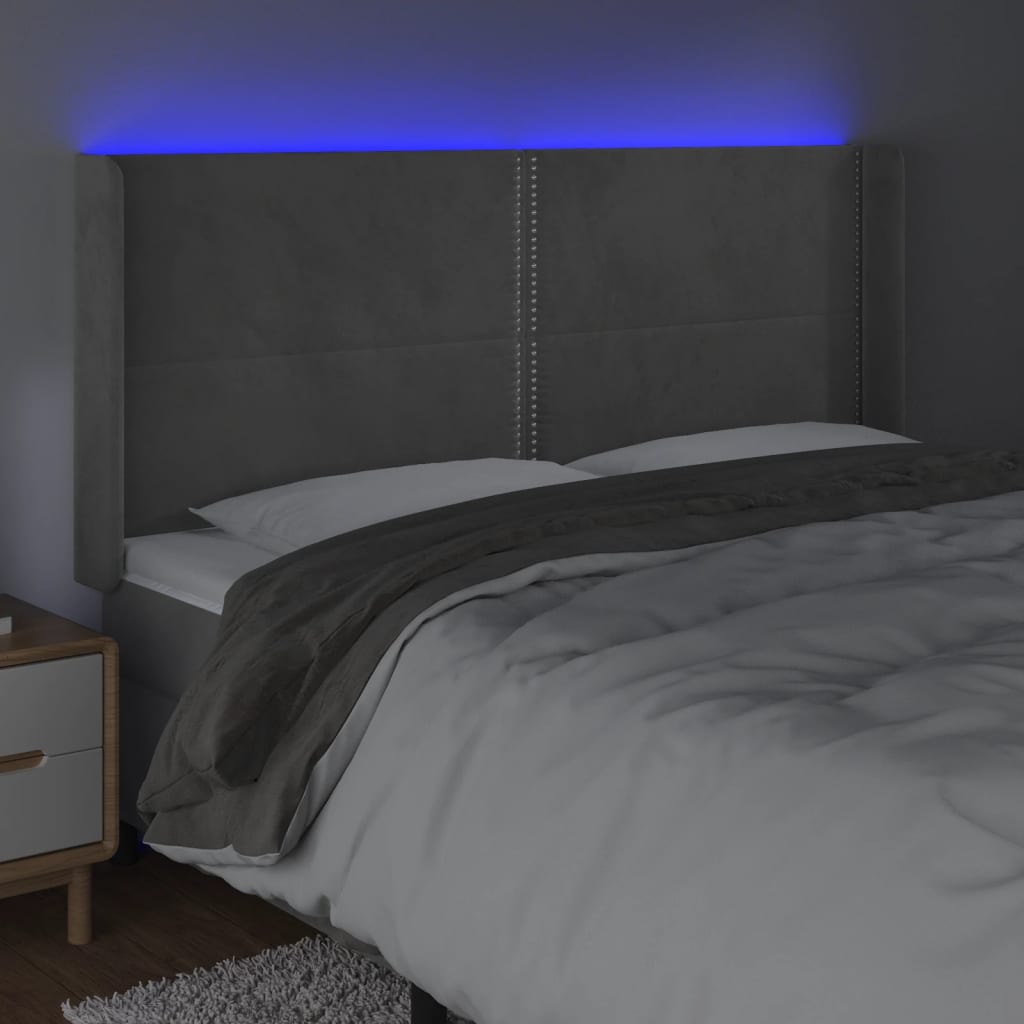 vidaXL sengegavl med LED-lys 163x16x118/128 cm fløjl lysegrå