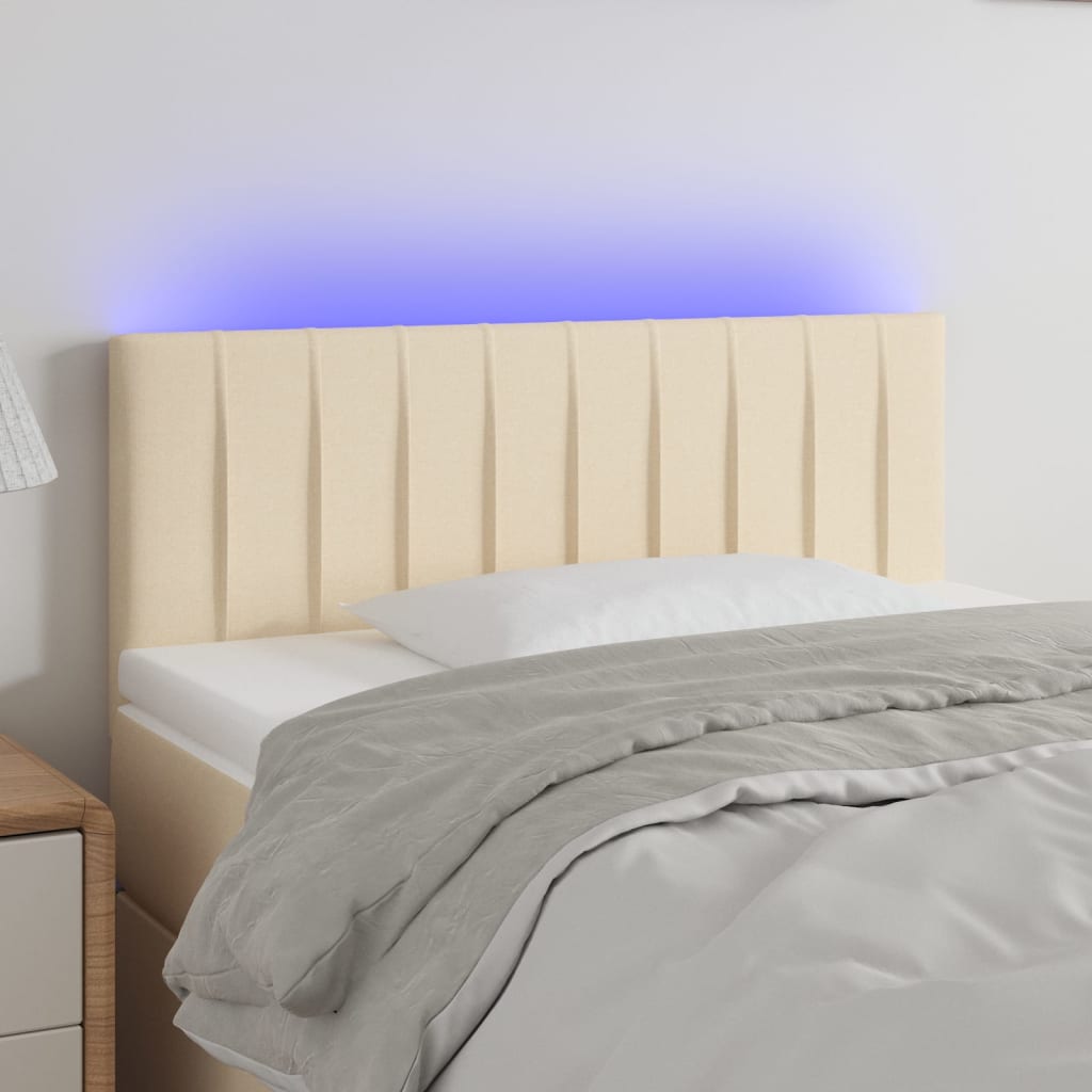 vidaXL sengegavl med LED-lys 100x5x78/88 cm stof cremefarvet